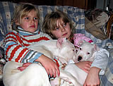 Girls relaxing with the dogs.